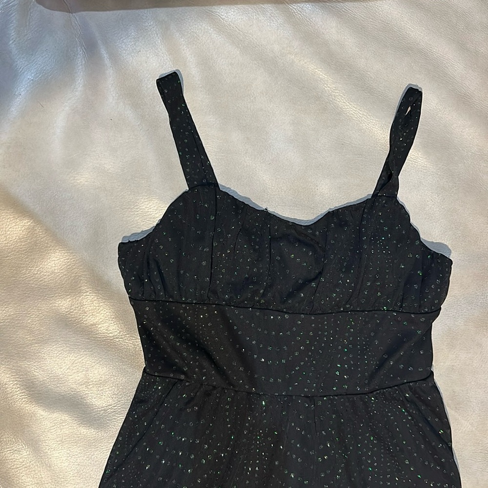 “She’s the 1 “black sparkle dress